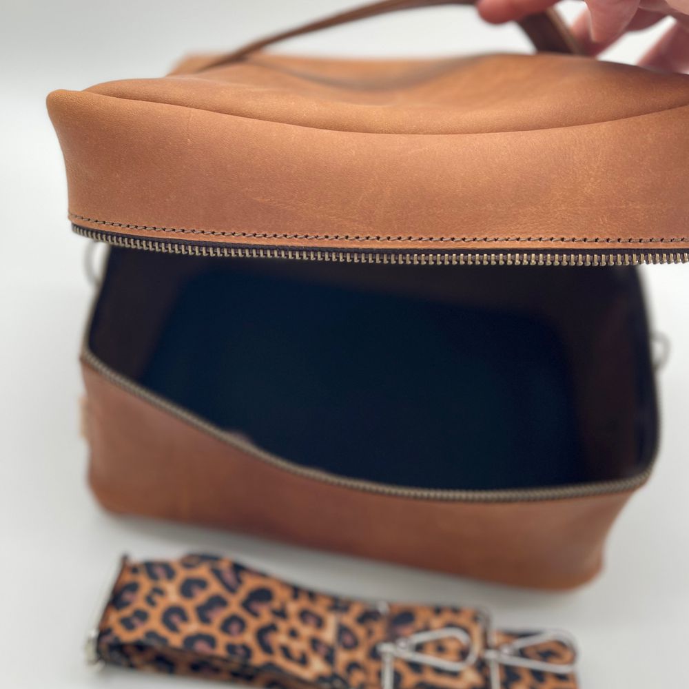 The Half-Moon Makeup Bag