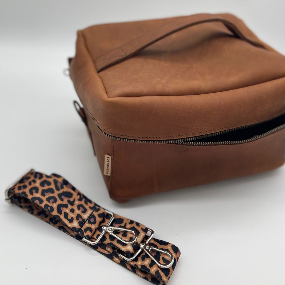 The Half-Moon Makeup Bag